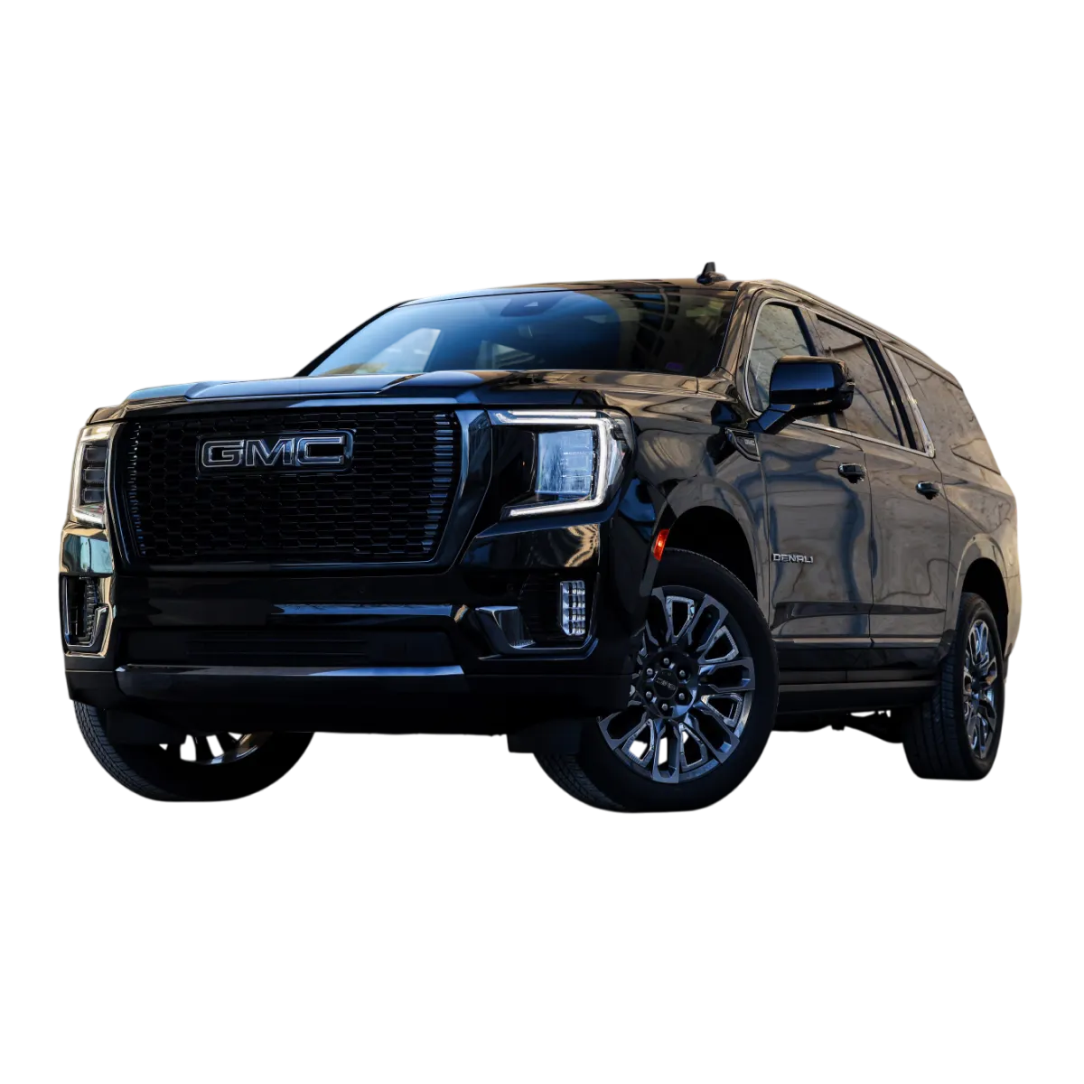 A 2025 GMC Yukon parked outside a building, promoting airport pickups and family travel with premium comfort in Chicago.